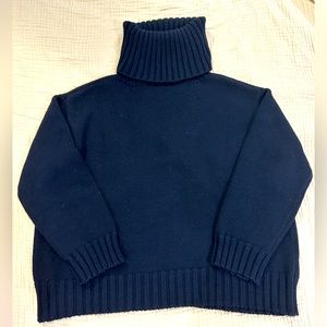 MONSE navy wool turtleneck open back sweater